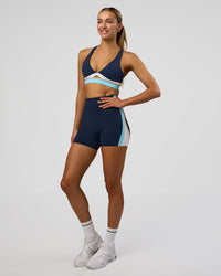 Woman wearing Revitalise Ultra High-Rise 4" Short - Future Navy-Multi | Model:Evie | Size:S