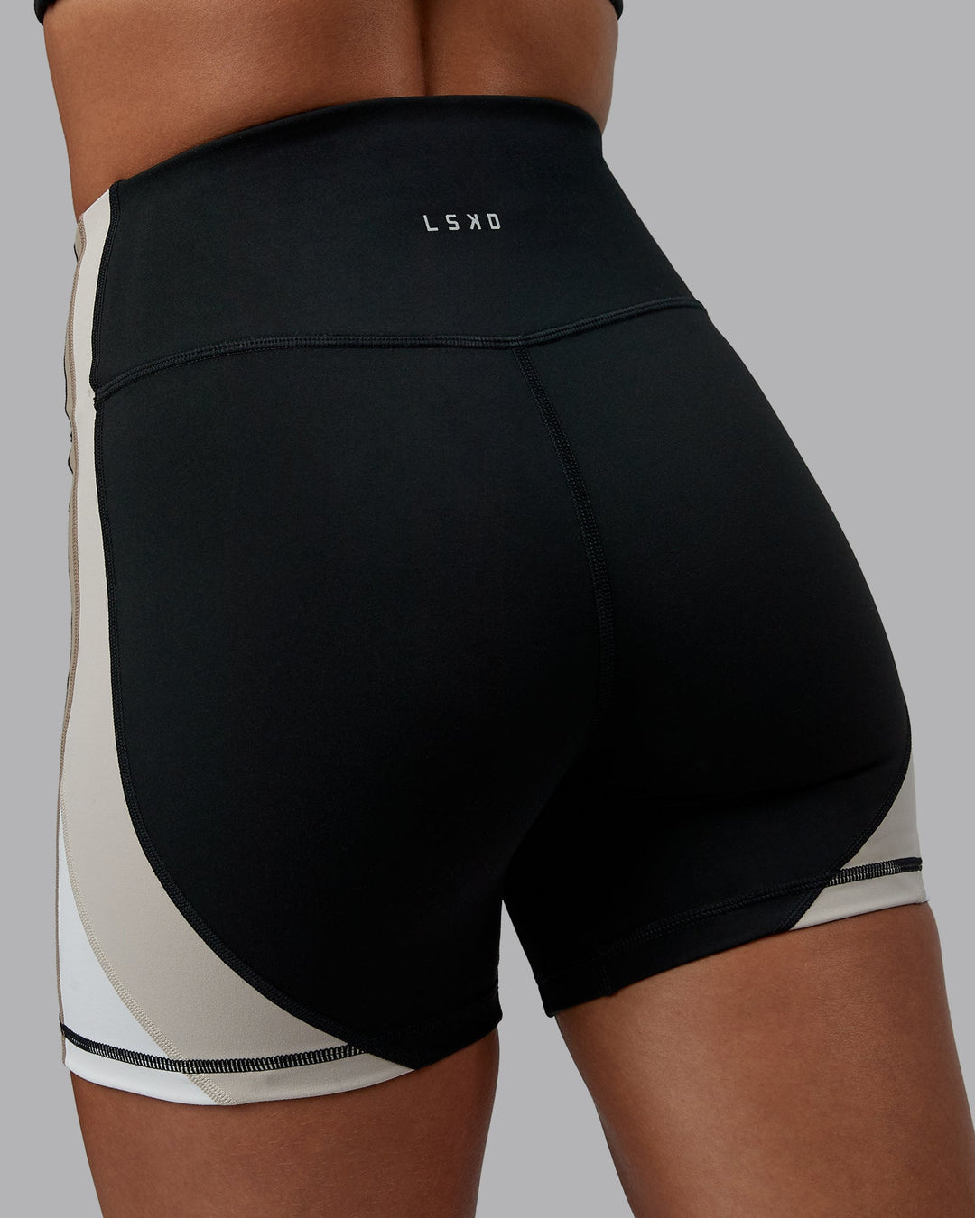 Woman wearing Revitalise Ultra High-Rise 4" Short - Black-Multi | Model:Tylah | Size:S - view 7