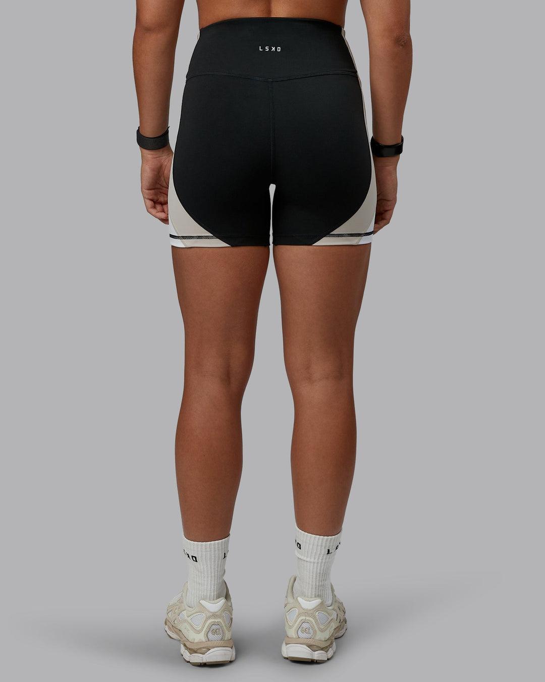 Woman wearing Revitalise Ultra High-Rise 4" Short - Black-Multi | Model:Tylah | Size:S - view 5