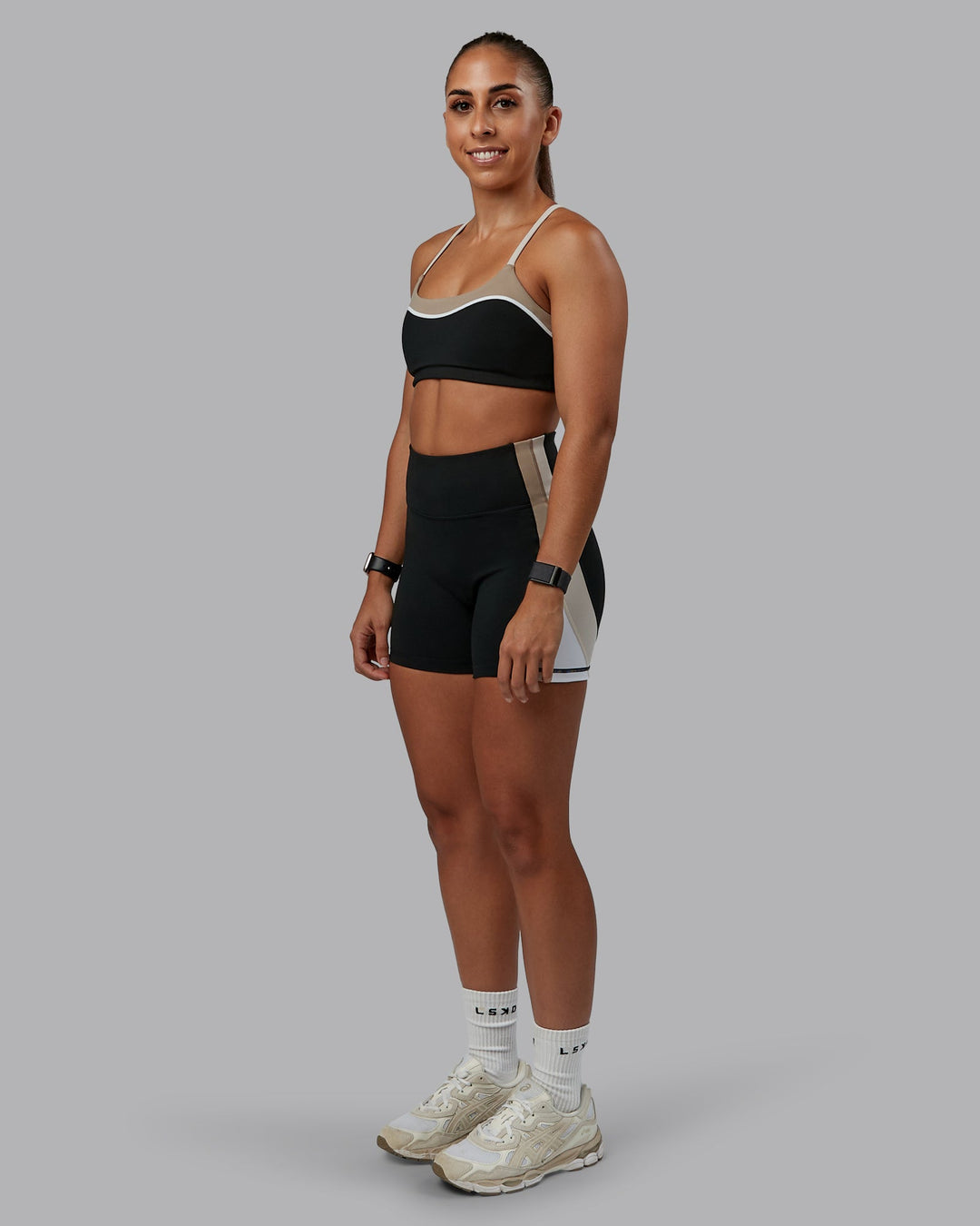 Woman wearing Revitalise Ultra High-Rise 4" Short - Black-Multi | Model:Tylah | Size:S - view 6