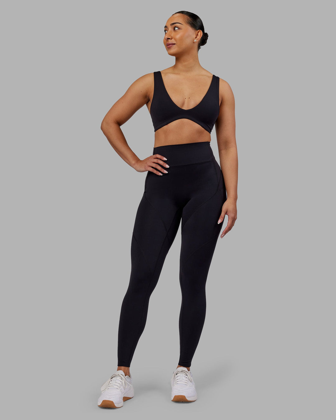 Woman wearing Rhythm Elixir Ultra High-Rise Full Length Legging Pockets - Black | Model:Ayla | Size:S