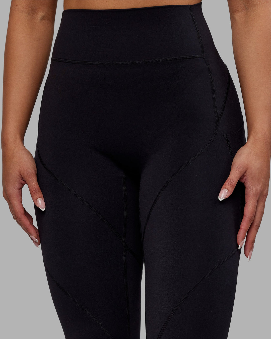 Woman wearing Rhythm Elixir Ultra High-Rise Full Length Legging Pockets - Black | Model:Ayla | Size:S