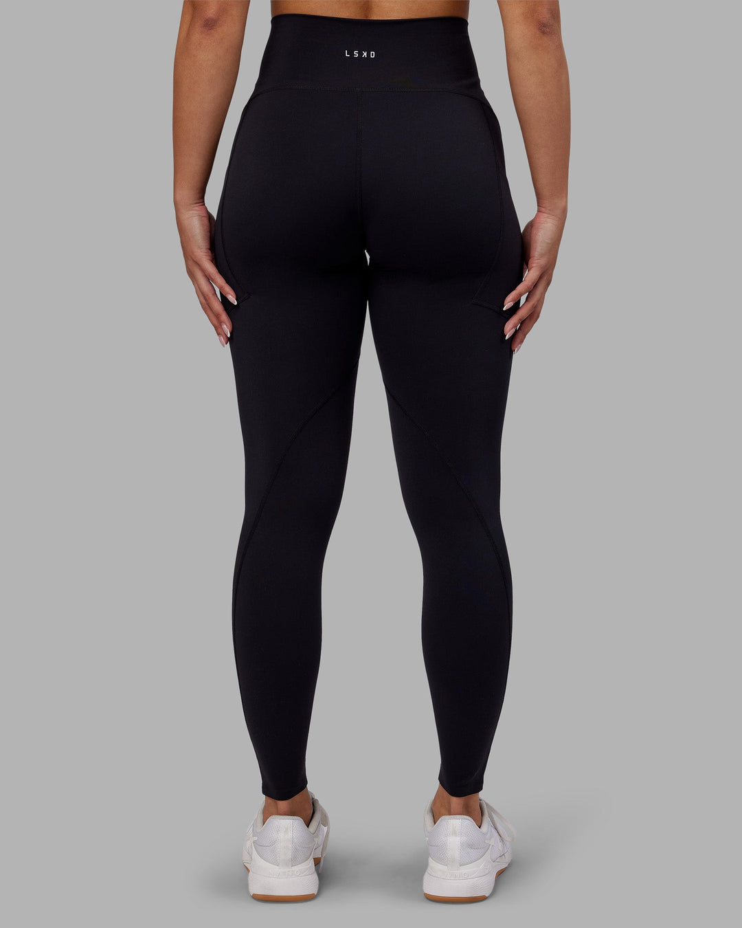 Woman wearing Rhythm Elixir Ultra High-Rise Full Length Legging Pockets - Black | Model:Ayla | Size:S