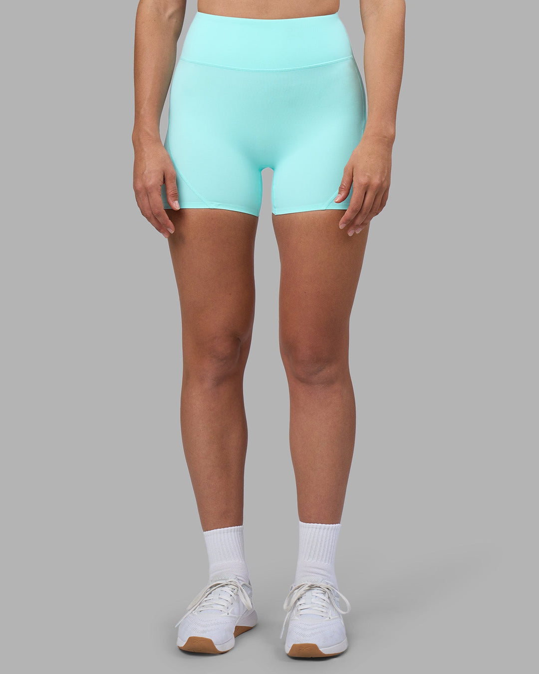 Woman wearing Rhythm Elixir Ultra High-Rise 4&quot; Short - Island Paradise | Model:Sophie | Size:S