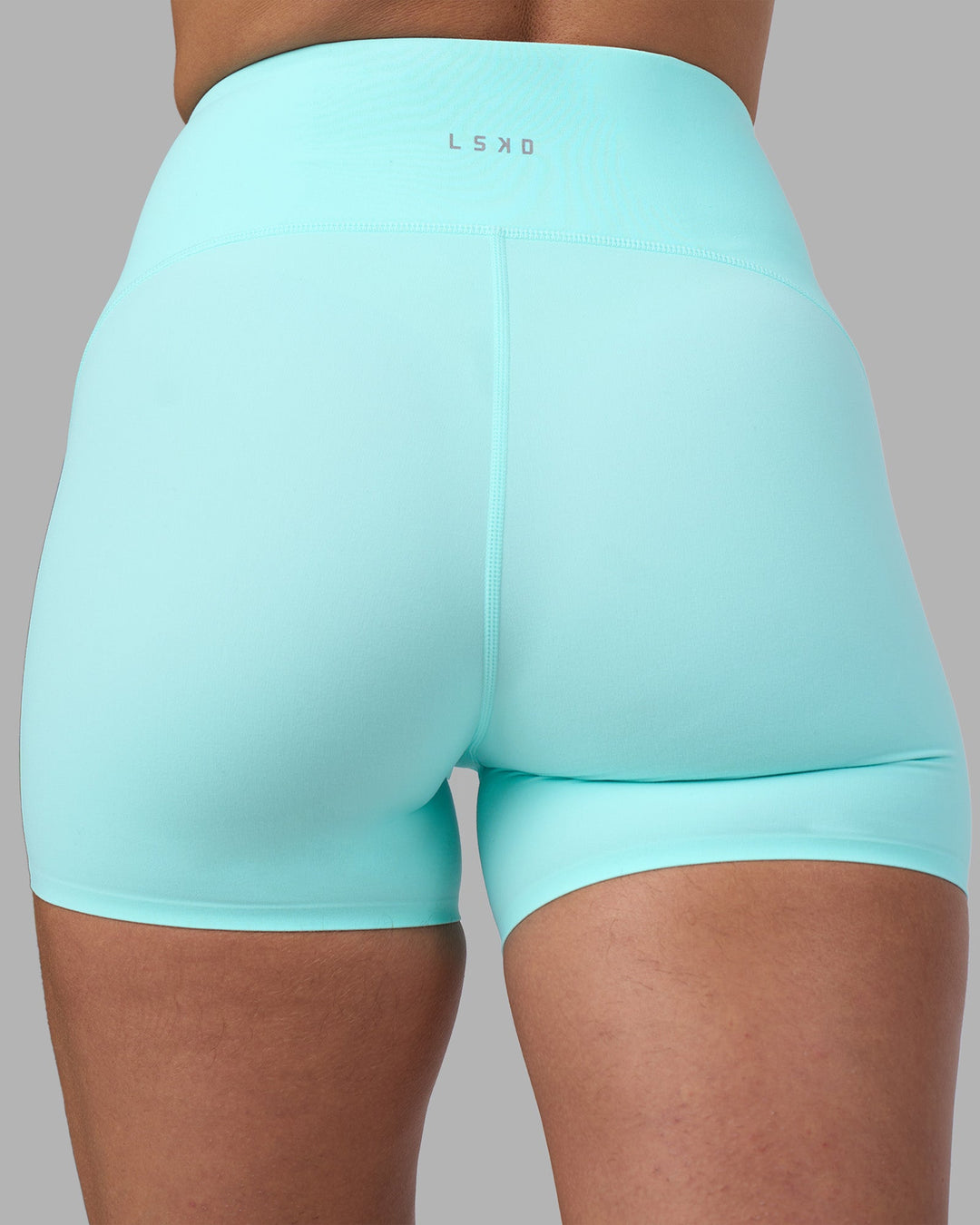 Woman wearing Rhythm Elixir Ultra High-Rise 4&quot; Short - Island Paradise | Model:Sophie | Size:S