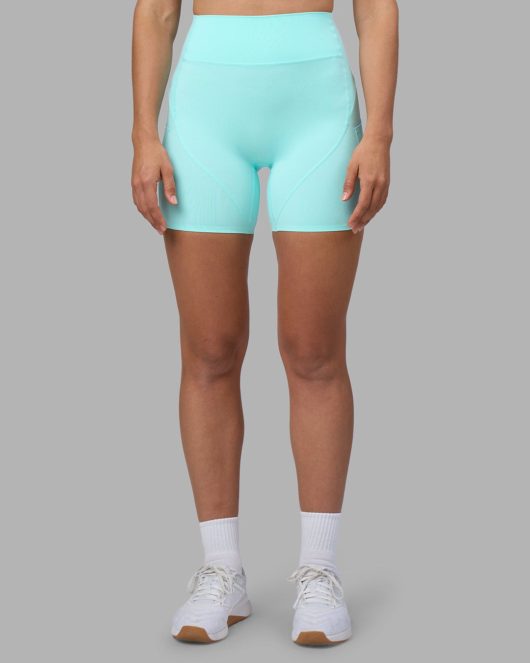Woman wearing Rhythm Elixir Ultra High-Rise 6&quot; Short Pockets - Island Paradise | Model:Sophie | Size:S