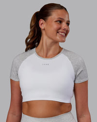 Woman wearing Run With It Ultra Cropped Tee - White-Grey Marl | Model:Phoebe | Size:S | Thumbnail Index: 3