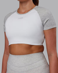 Woman wearing Run With It Ultra Cropped Tee - White-Grey Marl | Model:Phoebe | Size:S | Thumbnail Index: 5