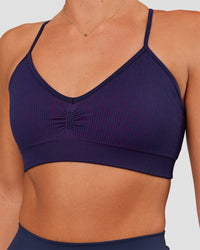 Woman wearing Spark Seamless Ribbed Sports Bra - Future Navy-Ultra Fuchsia | Model:Amity | Size:S | Thumbnail Index: 4
