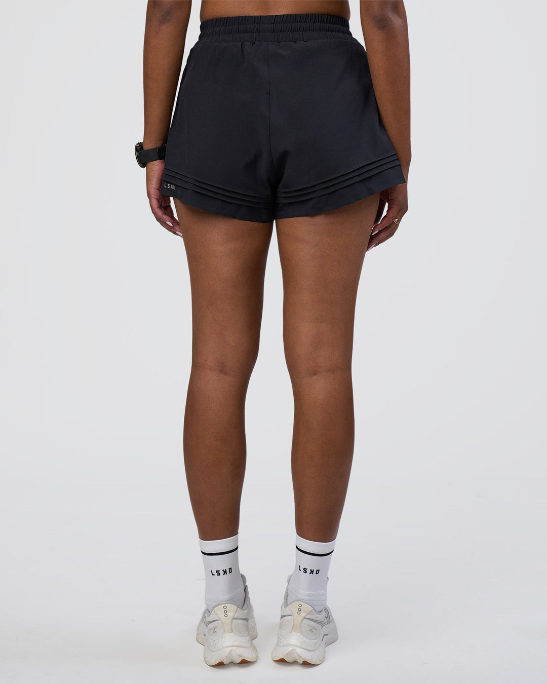 Woman wearing Sport Short 2.5&quot; - Black | Model:Rica | Size:S