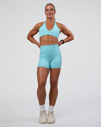 Woman wearing Stamina Pulse Sports Bra - Baltic Sea | Model:Sav | Size:S