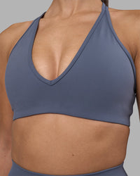 Woman wearing Stamina Pulse Sports Bra - Night Shadow | Model:Rhiley | Size:S | Thumbnail Index: 6