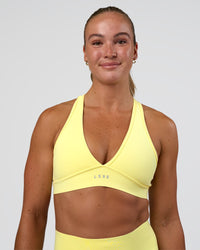 Woman wearing Stamina Rise Sports Bra - Yellow Fizz | Model:Sav | Size:S | Thumbnail Index: 3
