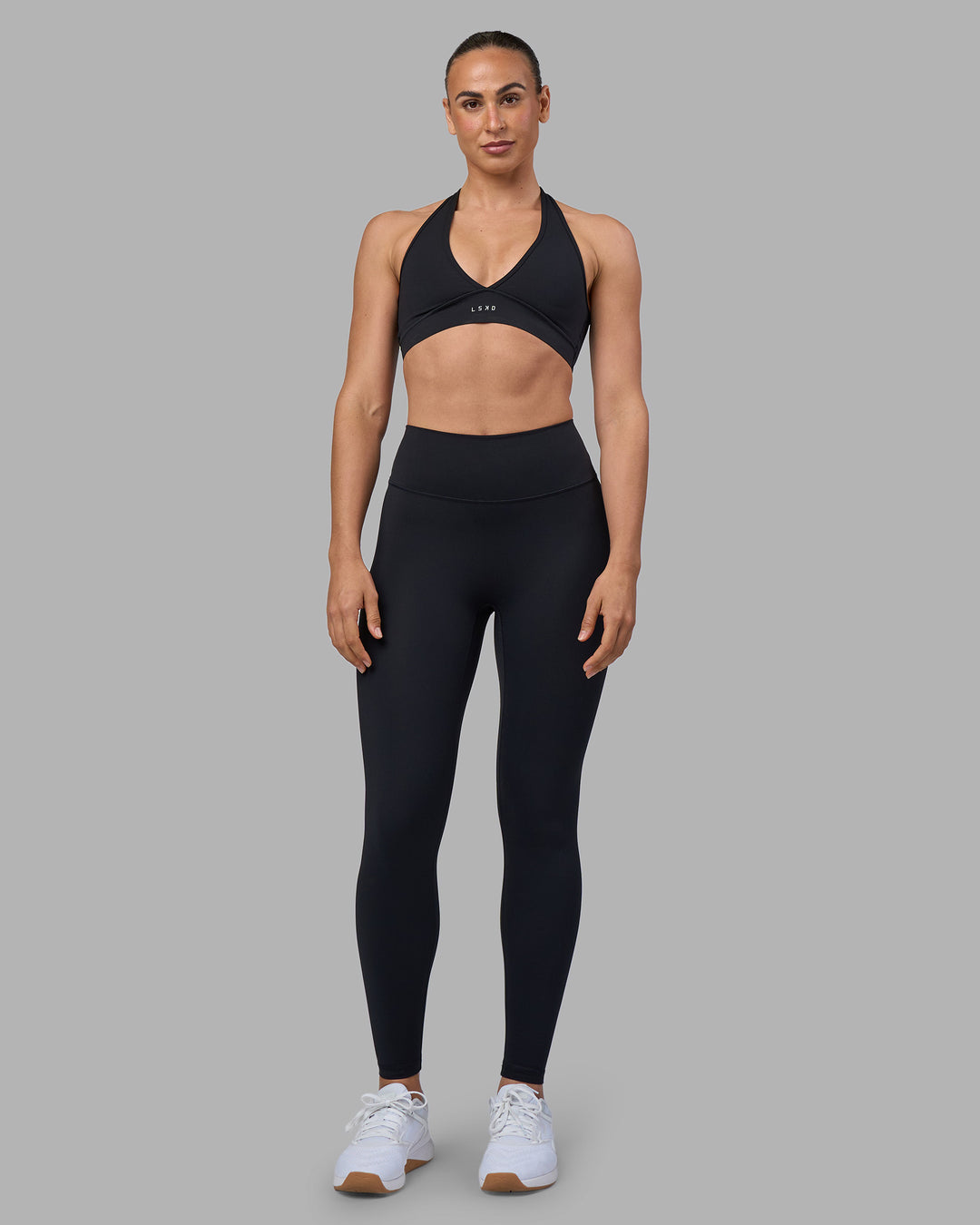 Woman wearing Stamina Sports Bra - Black | Model:Sophie | Size:S