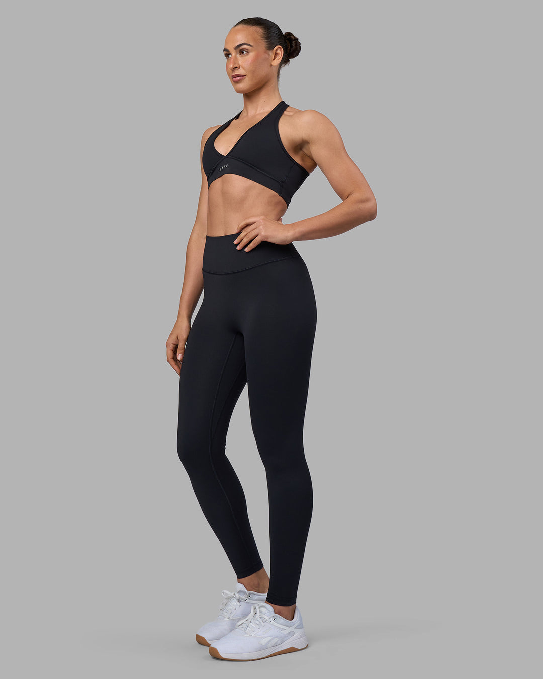 Woman wearing Stamina Sports Bra - Black | Model:Sophie | Size:S