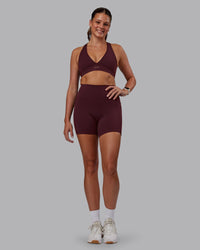 Woman wearing Stamina Sports Bra - Cherry Lacquer | Model:Phoebe | Size:S