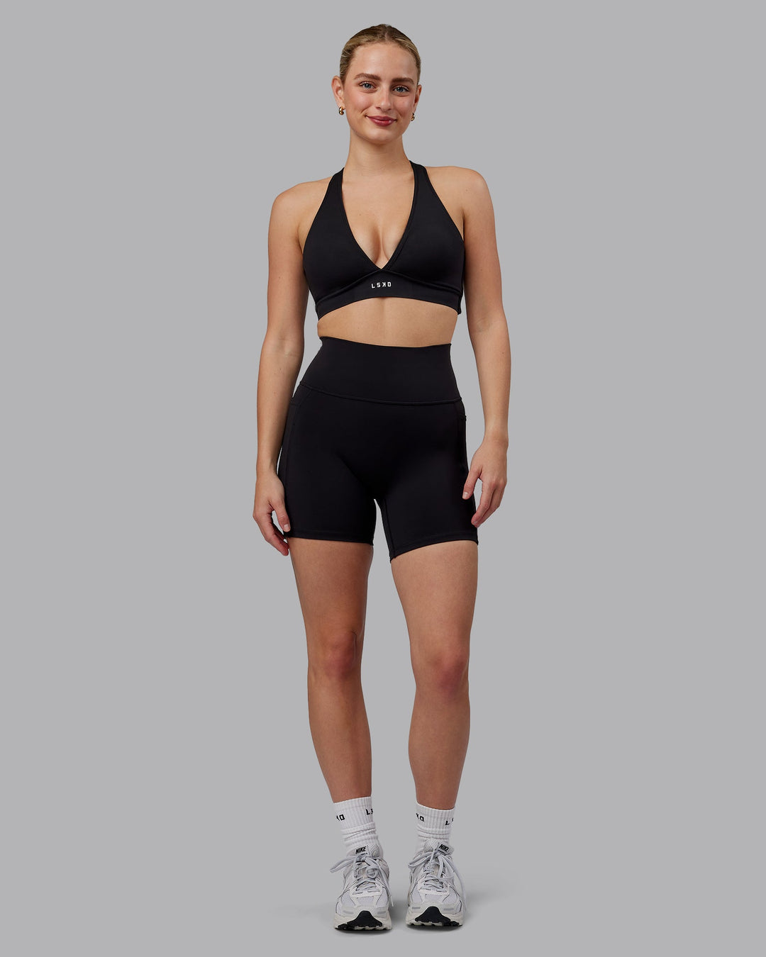 Woman wearing Stamina Sports Bra (D/DD/E) - Black