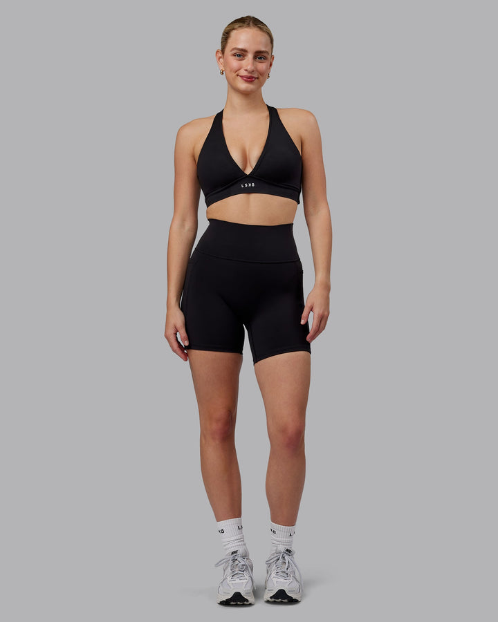 Woman wearing Stamina Sports Bra (D/DD/E) - Black
