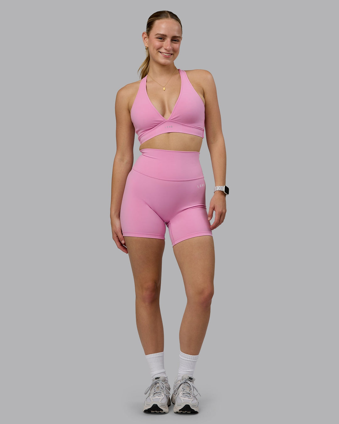 Woman wearing Stamina Sports Bra (D/DD/E) - Bubblegum