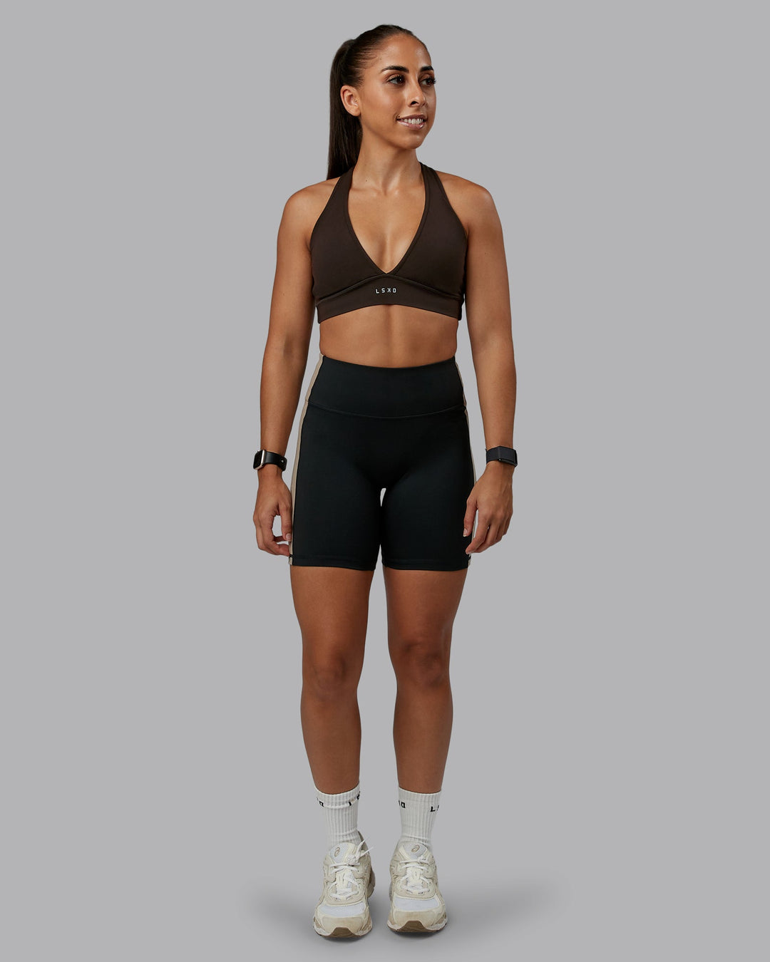 Woman wearing Stamina Sports Bra - Dark Walnut | Model:Tylah | Size:S