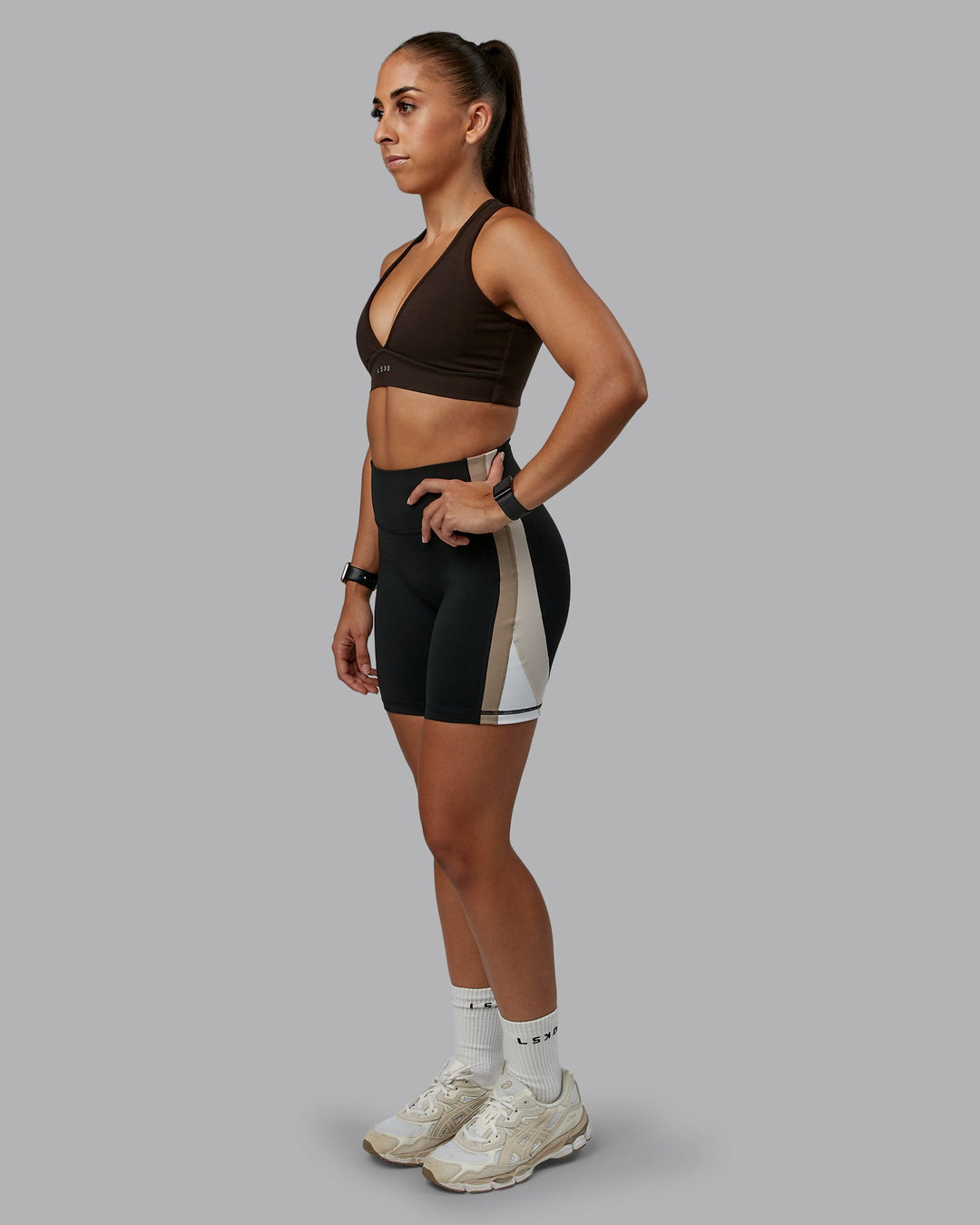 Woman wearing Stamina Sports Bra - Dark Walnut | Model:Tylah | Size:S