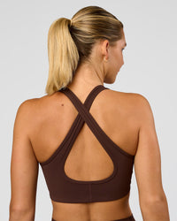 Woman wearing Stamina Sports Bra - Hot Chocolate | Set:true | Angle:back | Model:Amity | Size:S | Thumbnail Index: 2