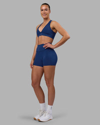 Woman wearing Stamina Sports Bra - Midnight Blue | Model:Charlize | Size:S