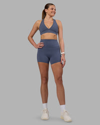 Woman wearing Stamina Sports Bra - Night Shadow | Model:Phoebe | Size:S