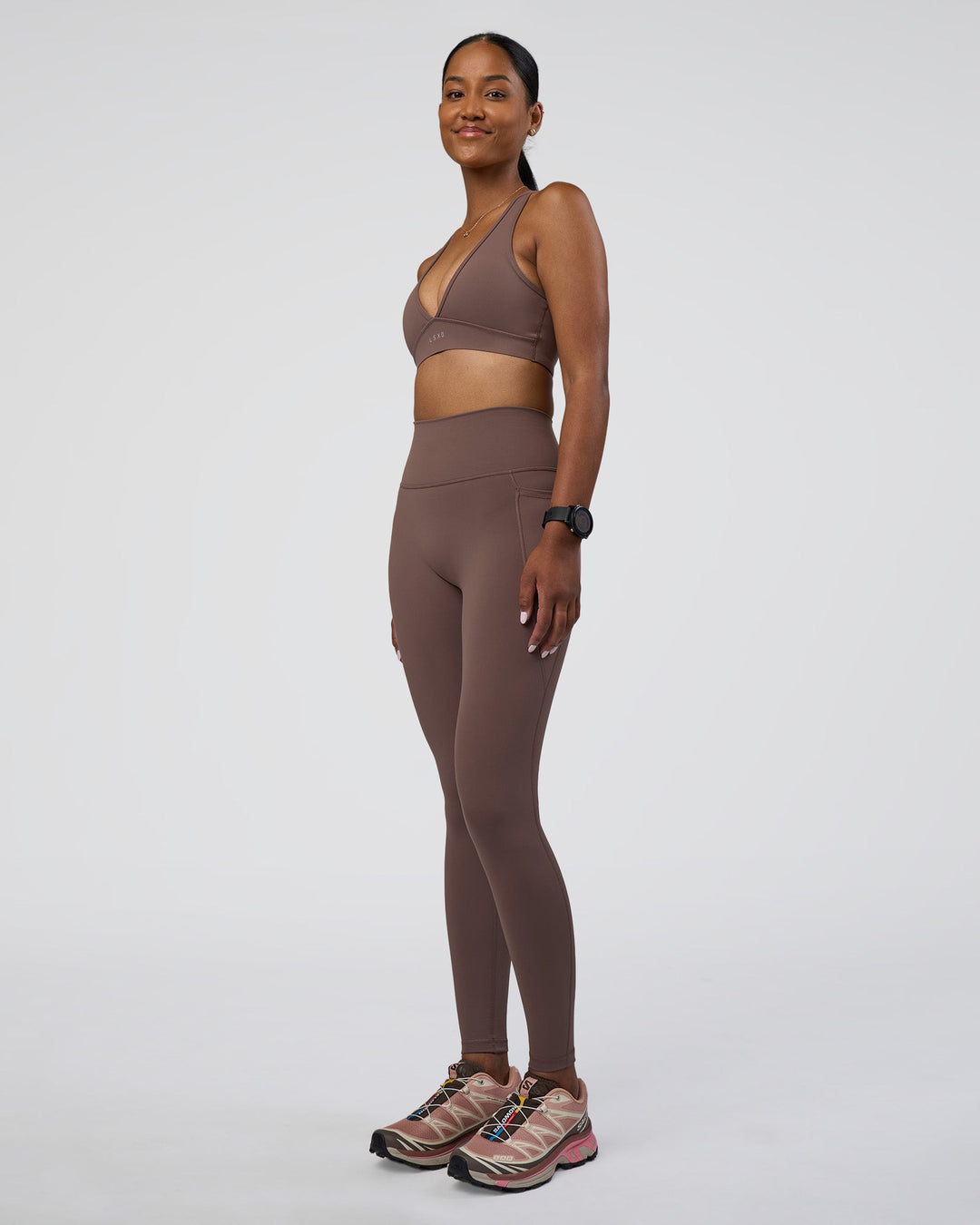 Woman wearing Stamina Sports Bra - Peppercorn | Model:Rica | Size:S