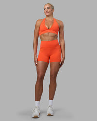 Woman wearing Stamina Sports Bra - Ultra Orange | Model:Katie | Size:S