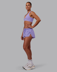 Woman wearing Stamina Sports Bra - Violet Ray | Model:Charlize | Size:S | Thumbnail Index: 2