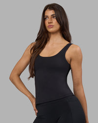 Woman wearing Staple Active Shelf Bra Tank - Black | Model:Phoebe | Size:S