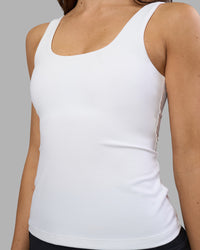 Woman wearing Staple Active Shelf Bra Tank - White | Model:Phoebe | Size:S