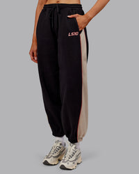 Woman wearing Stitch Up Fleece Sweat Pant - Black/Shale Beige | Model:Ella | Size:S | Thumbnail Index: 6
