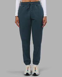 Woman wearing Stream Panel Track Pants - Deep Sea | Model:Rhiley | Size:S