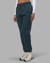 Woman wearing Stream Panel Track Pants - Deep Sea | Model:Rhiley | Size:S