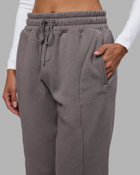 Woman wearing Stream Panel Track Pants - Storm Front | Model:Rhiley | Size:S