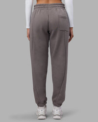 Woman wearing Stream Panel Track Pants - Storm Front | Model:Rhiley | Size:S