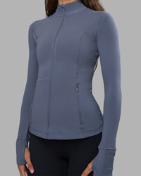 Woman wearing Stride Zip Through Jacket - Night Shadow | Model:Phoebe | Size:S