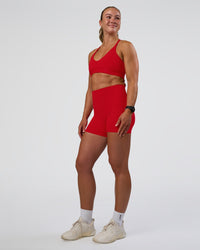 Woman wearing Strive Jacquard Sports Bra - Flame | Model:Sav | Size:S | Thumbnail Index: 2
