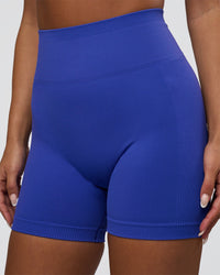 Woman wearing Surge Seamless High-Rise 6" Short - Power Cobalt | Model:Bianca | Size:S | Thumbnail Index: 0