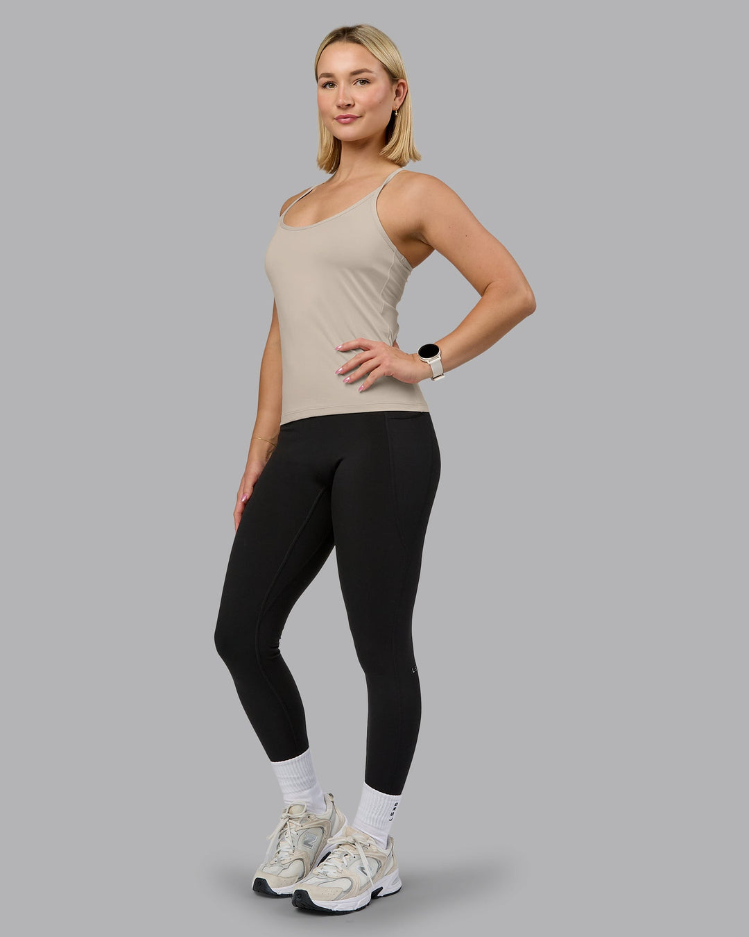 Woman wearing Transition CloudFLX Shelf Bra Tank - Shale Beige | Model:Halle | Size:S - view 5