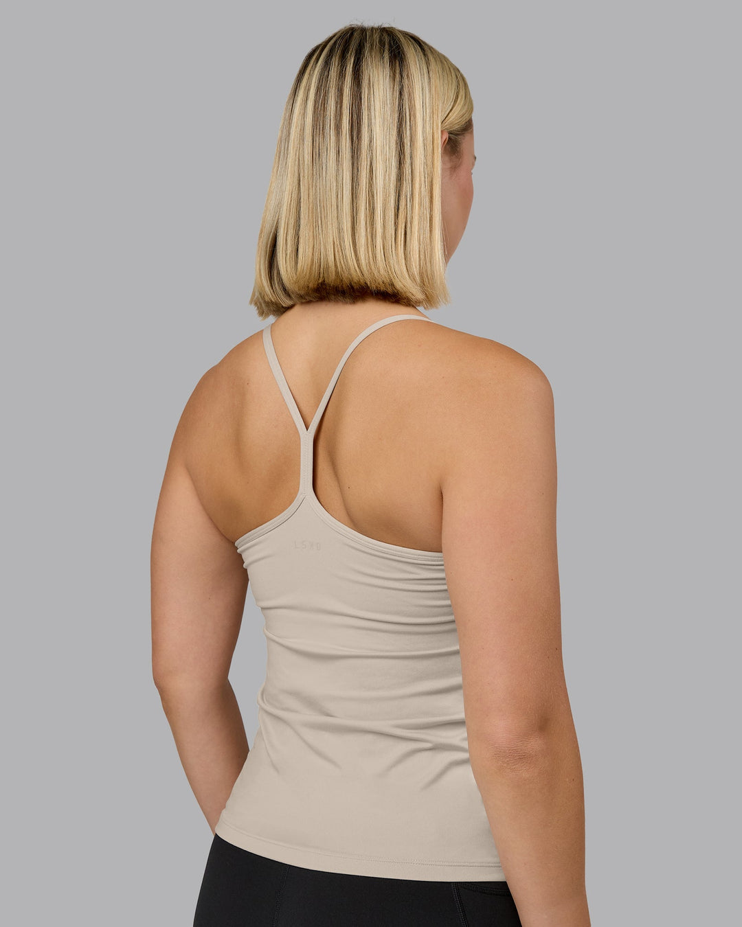 Woman wearing Transition CloudFLX Shelf Bra Tank - Shale Beige | Model:Halle | Size:S - view 2
