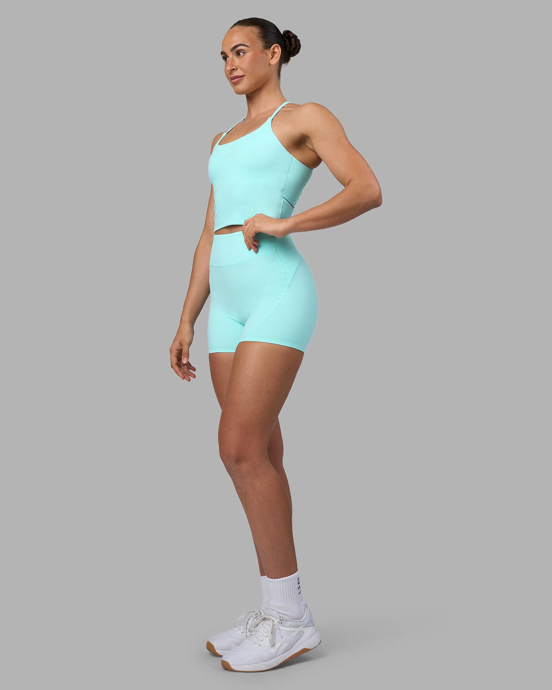 Woman wearing Twist Tank With Shelf Bra - Island Paradise | Model:Sophie | Size:S