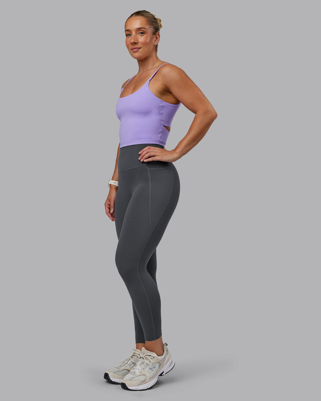 Woman wearing Twist Shelf Bra Tank in Violet Ray | Size:S