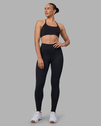 Woman wearing Twist Sports Bra - Black | Model:Sophie | Size:S | Thumbnail Index: 3