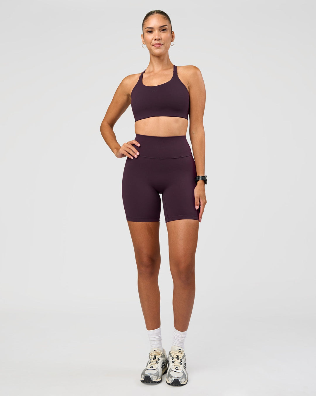 Woman wearing Twist Sports Bra D/DD/E - Midnight Plum | Model:Rhiley | Size:S - view 6