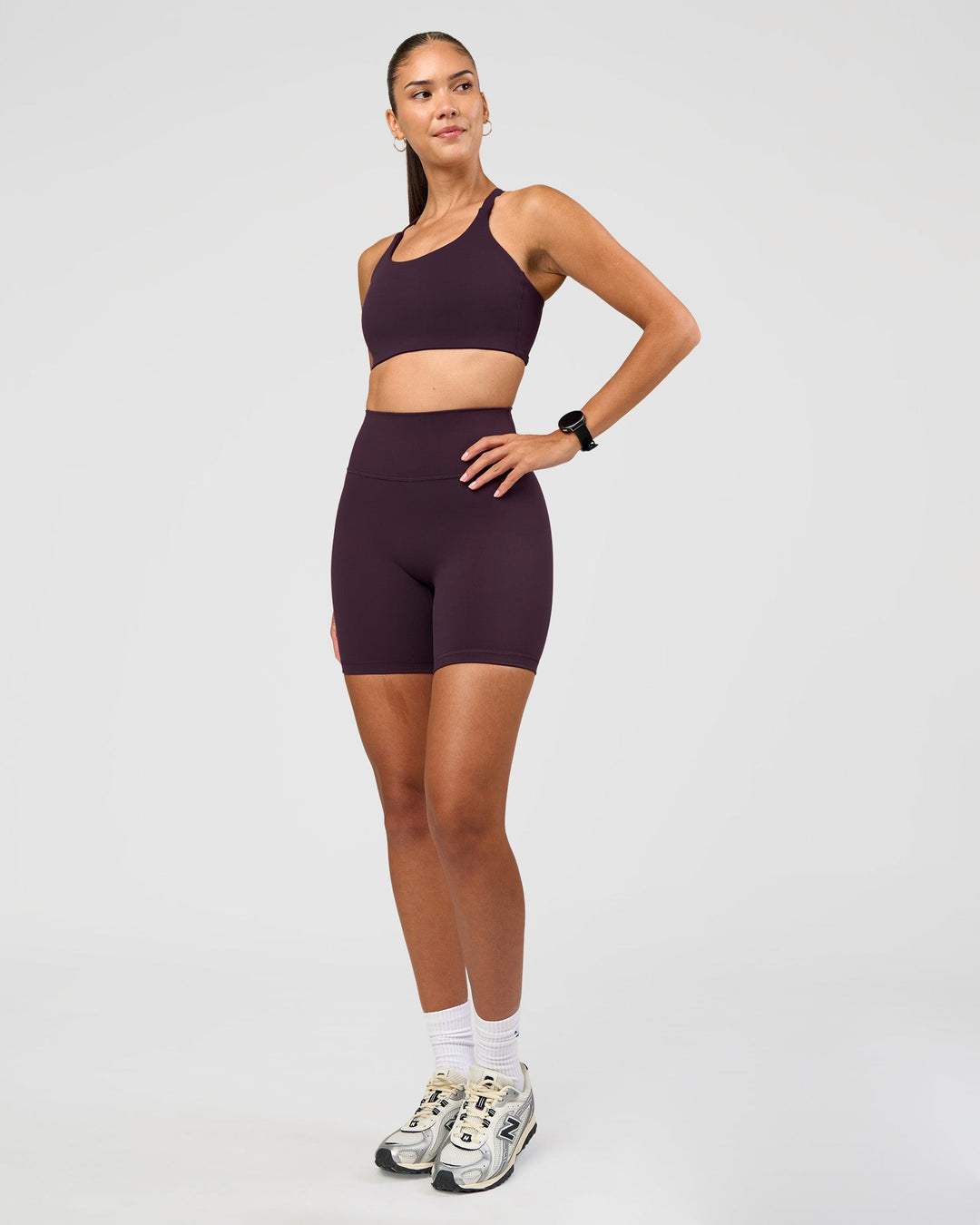 Woman wearing Twist Sports Bra D/DD/E - Midnight Plum | Model:Rhiley | Size:S - view 8