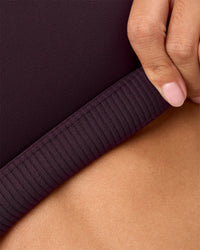 Woman wearing Twist Sports Bra D/DD/E - Midnight Plum | Model:Rhiley | Size:S | Thumbnail Index: 6