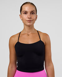 Woman wearing Twister Shelf Bra Tank - Black | Model:Myrte | Size:S | Thumbnail Index: 0